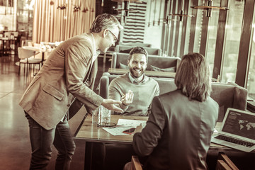 Emotional men discussing their future business project