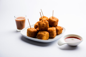Crispy Paneer popcorn is a popular party snack and an appetiser. selective focus