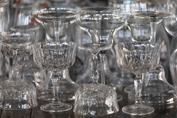 Glassware on a stainless steel hotel bar 