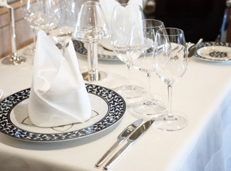 Restaurant Table Set Up With Wine Glass And Cutlery