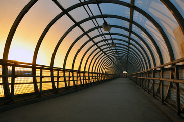 Pedestrian tunnel, crossing the roadway. At sunset