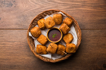 Crispy Paneer popcorn is a popular party snack and an appetiser. selective focus