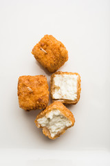 Crispy Paneer popcorn is a popular party snack and an appetiser. selective focus