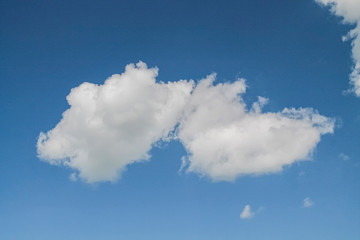 white clouds in the blue sky. background