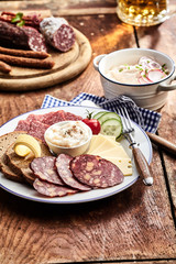 Lunch platter with slices of wild venison sausage
