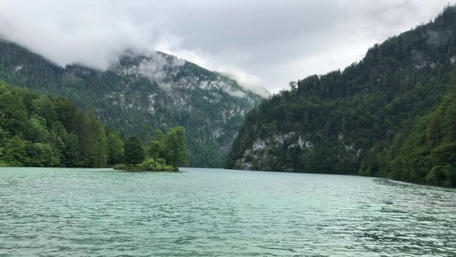 Beautiful view on on Konigssee (K&ouml;nigssee, K&ouml;nigsee, Konigsee, Koenigssee, Koenigsee, Konig) lake in autumn. yellow trees. Berchtesgaden National Park, Bayern (Bavaria), Germany.
