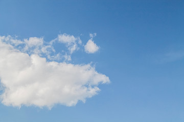 white clouds in the blue sky. background