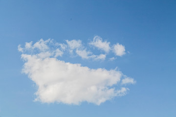 white clouds in the blue sky. background