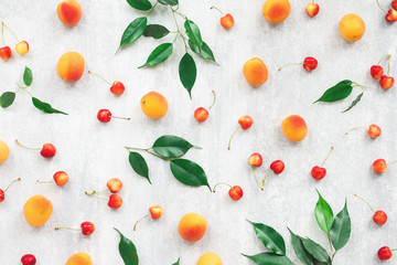 Summer fruits on grey background, flat lay, top view