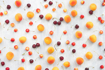 Summer fruits on grey background, flat lay, top view