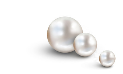 Two large white pearls on blue and white cloudy blur background