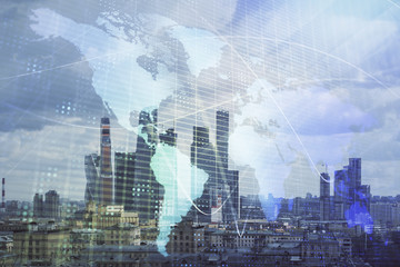 Double exposure of world map on city veiw background. Concept of international trading
