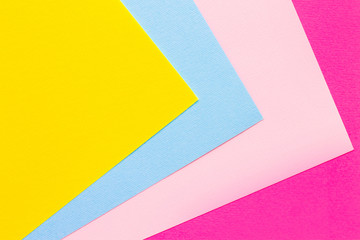 Several colored sheets of paper for pastels on the table