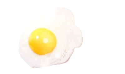 Fried egg top view on white background