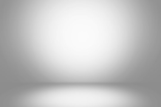Abstract empty white and gray gradient  soft light background of studio room for art work design.