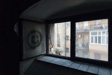view from a dark warehouse through the window