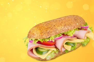 Footlong ham & swiss submarine sandwich isolated on white