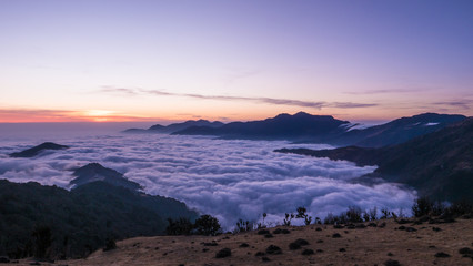 among the clouds on top of mountains