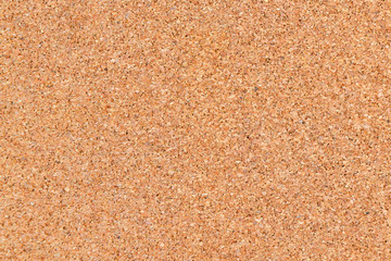 Brown cork board surface for background.