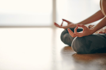 Woman doing mudra during yoga flow