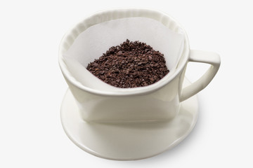 Drip coffee with paper filter tool on white background
