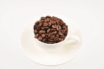Cup of coffee and coffee beans.