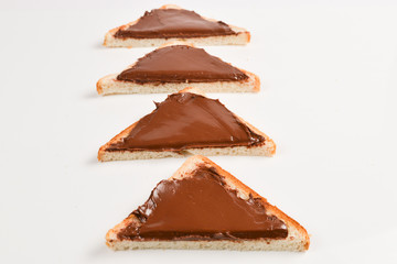 Сhocolate paste sandwich isolated on white background.