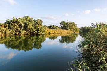 Panoramic  view in the rays of the setting sun over the Alexander River near Kfar Vitkin, in northern Israel