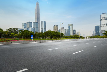 Fototapeta na wymiar empty highway with cityscape and skyline of shenzhen,China