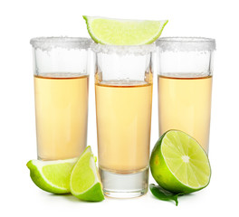 Shot of tequila with a slice of lime no white background