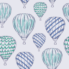 Vector seamless pattern of green and blue hot air balloons in the sky. Boys Nursery illustration great for wallpaper, wrapping and decor. © Nespola Designs