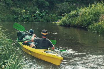 Canoeing on the forest river.