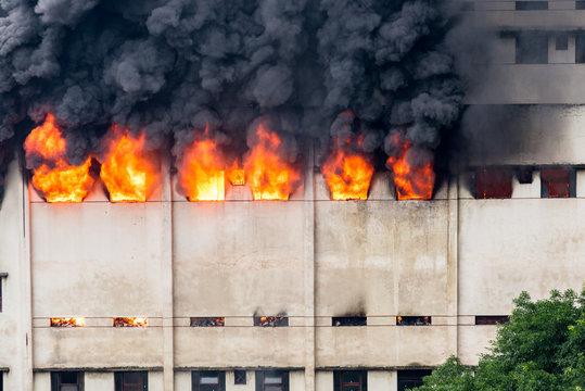 A fire broke out in the warehouse and the fire brigade was putting out the fire.