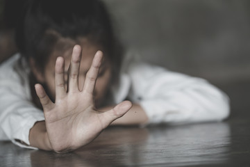 Stop sexual harassment and violence against women, rape and sexual abuse concept,  STOP gesture with hand, Stop drugs,  human rights violations, human trafficking, Copy space.
