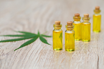 Hemp oil, Marijuana oil bottle, cannabis oil extracts in jars, medical marijuana, CBD oil pipette.
