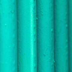 Many old green pipes. Pipeline used in different industry ways: gas, water or vapor supply. Close up