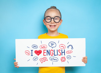 beautiful cute little girl holding a white paper with message