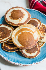 Stack of Plain Pancakes in Plate.