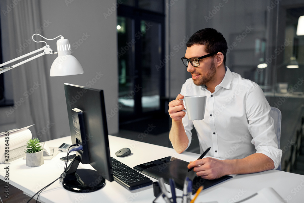 Canvas Prints business, graphic design and technology concept - smiling businessman or designer with computer and pen tablet drinking coffee at dark night office