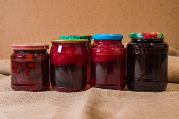 Homemade preserves on a rustic table