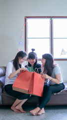 Three Asian girl happy after shopping