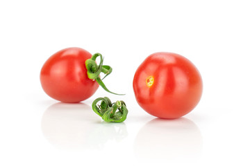 Group of two whole one piece of fresh red tomato cherry isolated on white background