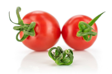 Group of two whole one piece of fresh red tomato cherry isolated on white background