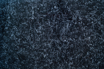 abstract pattern on a marble slab white over black