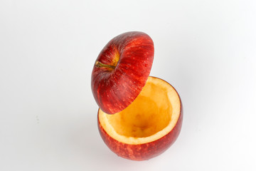 Health Red Cut Apple floating top slice juice drink idea concept on white background