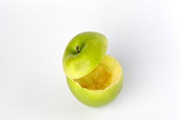 Healthy Green Cut Apple floating top slice juice drink idea concept on white background