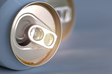 Beer cans that have been opened and drained, soft light images