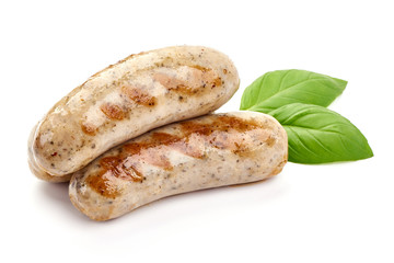 Grilled Munich Veal Sausages, close-up, isolated on white background
