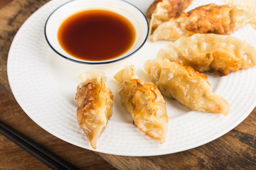 Japanese gyoza or dumplings snack with soy sauce