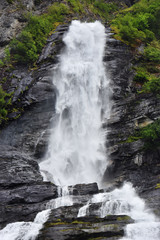 The Seven Sisters unique waterfall at Geirangerfjord seens by boat trip, Sunnmore region, Norway,  most beautiful fjords in the world, included on the UNESCO World Heritage.